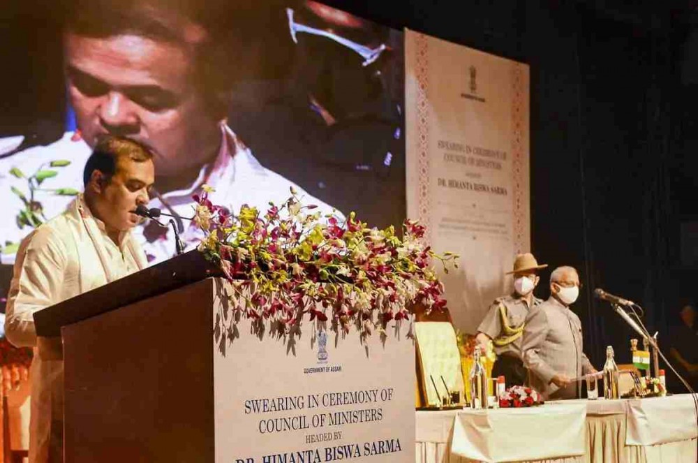 BJP's Himanta Biswa Sarma takes oath as the new Chief Minister of Assam, during his swearing-in ceremony at Srimanta Sankaradev Kalakshetra in Guwahati, Monday, May 10, 2021. (PTI Photo)