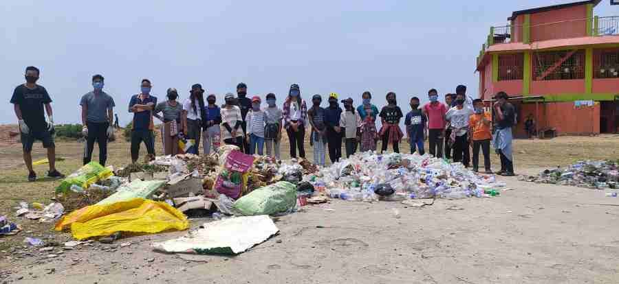 The volunteers during the mass social work conducted at local ground, Wokha under the theme ‘your waste is your responsibility’ on April 30.