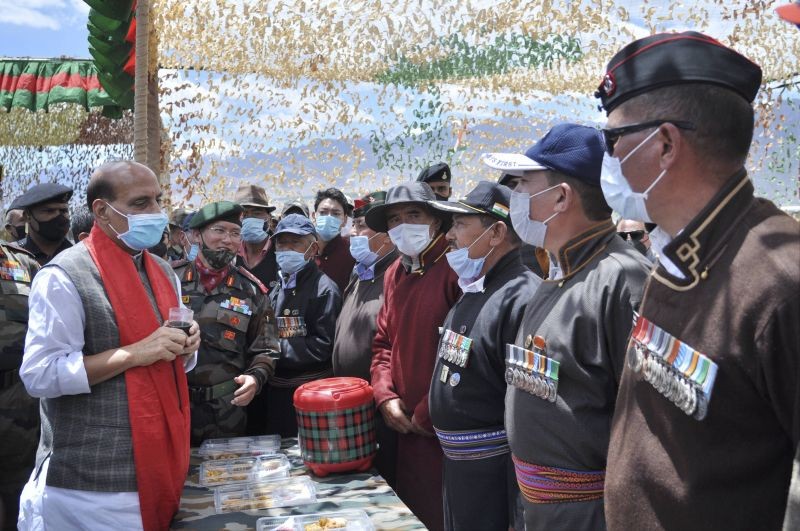 Defence Minister Rajnath Singh interacting with the veterans in Leh on June 27, 2021. (PTI Photo)