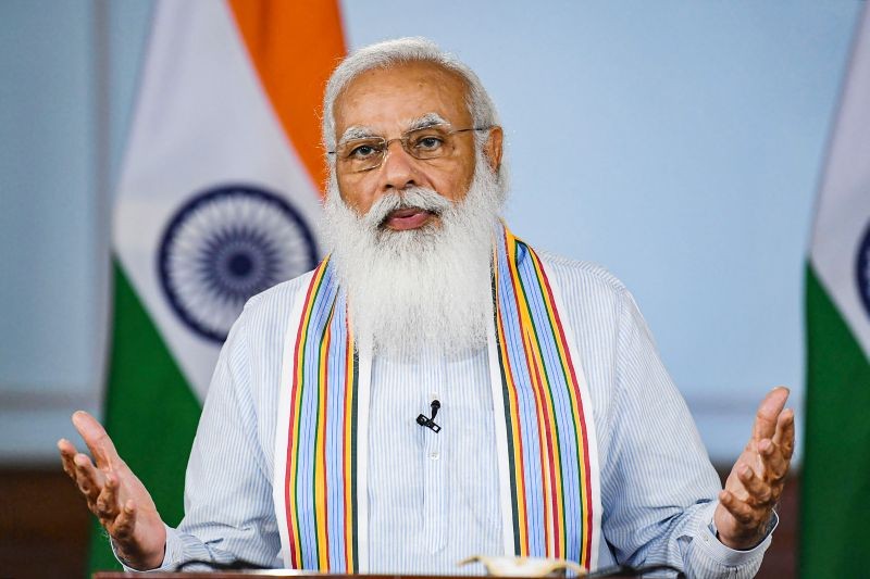 Prime Minister Narendra Modi addresses the launch of the ‘Customized Crash Course programme for COVID-19 Frontline workers’, through video conferencing, in New Delhi. (PTI Photo)