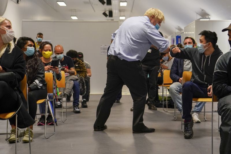 Britain's Prime minister Boris Johnson meets members of the public as he visits a vaccination centre at the StoneX Stadium, home of the rugby club Saracens, in North London on June 21.  (AP/PTI Photo)