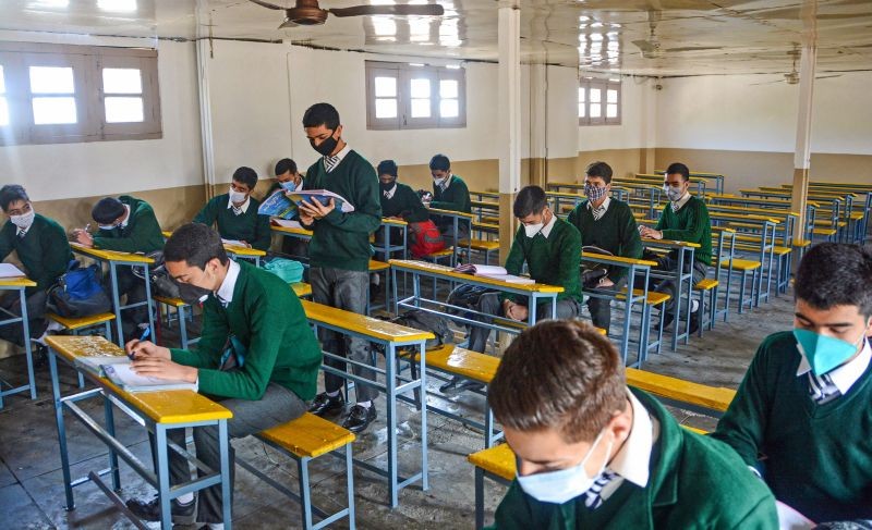 Students wearing masks attend a class. (PTI File Photo)