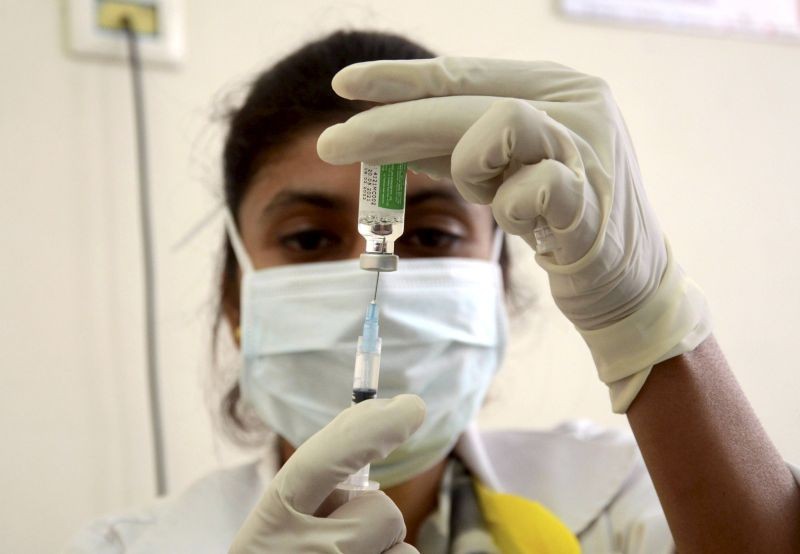 Amritsar: A medical worker prepares to inoculate a person with a dose of the Covishield vaccine , at a government hospital in Amritsar, Friday, June 18, 2021. (PTI Photo)