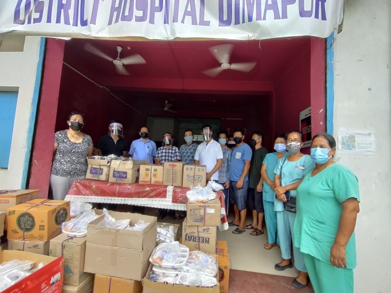 The committee members delivering lunch to frontline workers at District Hospital Dimapur on June 1.