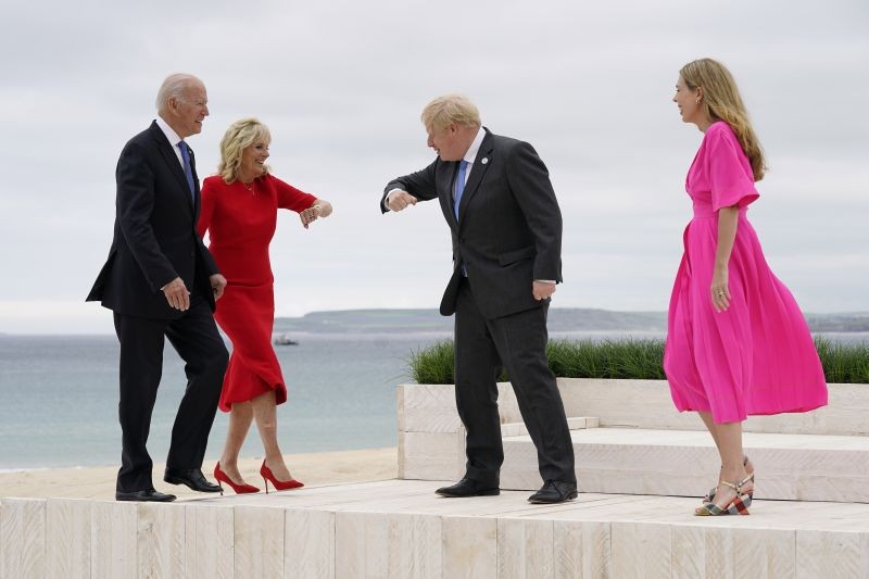 President Joe Biden and first lady Jill Biden are greeted by British Prime Minister Boris Johnson and his wife Carrie Johnson before posing for photos at the G-7 summit on June 11 in Carbis Bay, England. (AP/PTI Photo)