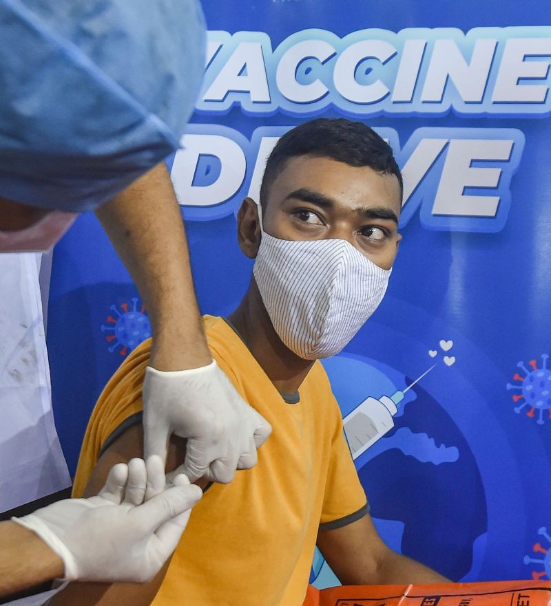 A beneficiary receives his first dose of the Covishield vaccine, at a vaccination centre in Kolkata on June 24, 2021. (PTI Photo)