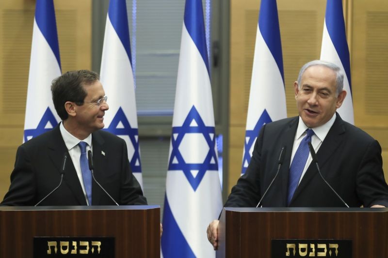 Israeli Prime Minister Benjamin Netanyahu, right, delivers a statement with President-elect Isaac Herzog after a special session of the Knesset whereby Israeli lawmakers elected a new president, at the Knesset, Israel's parliament, in Jerusalem on June 2, 2021. (AP/PTI File Photo)