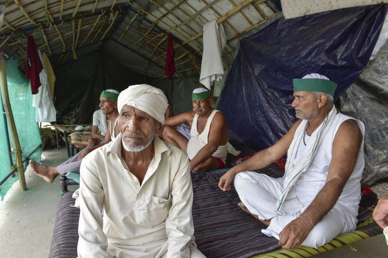 Farmers during their protest against new farm laws, at Ghazipur border, in New Delhi on June 9, 2021. (PTI Photo)
