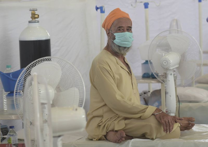 A COVID-19 patient receives treatment at Guru Tegh Bahadur COVID care centre at Gurdwara Rakab Ganj Sahib, in New Delhi on June 1, 2021.  (PTI Photo)