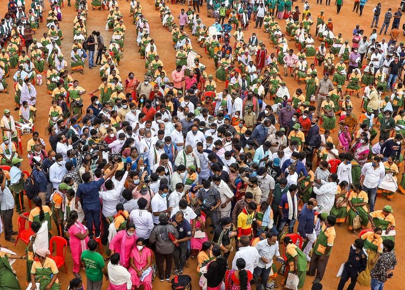 Congress leaders distribute ration kits to Bruhat Bengaluru Mahanagar Palike (BBMP) Pourakarmikas, Asha workers and other COVID warriors, in Bengaluru on June 16, 2021. (PTI Photo)