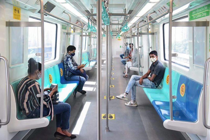 Greater Noida: Commuters ride a metro train that resumed its services following ease in COVID-19 lockdown, in Greater Noida, Wednesday, June 9, 2021. (PTI Photo)