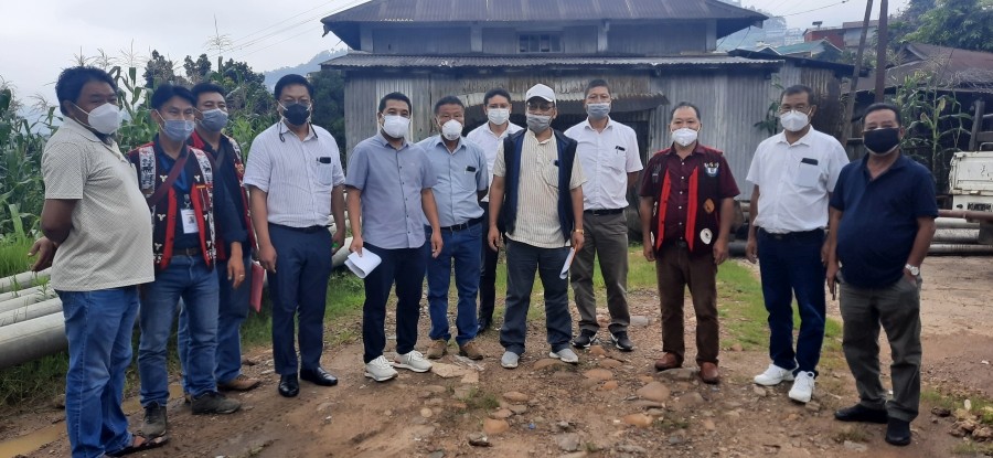 Tongpang Ozukum with power department officials, district administration, All Ward Union Mokokchung, NDPP officials and 24 Angetyongpang AC Independent party officials at Power house, Salangtem ward, Mokokchung on June 23.