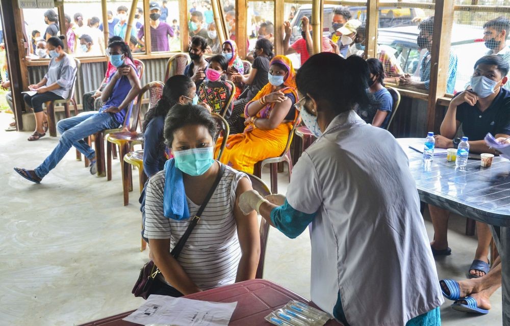 Dimapur: A medic administers a dose of COVID-19 vaccine to a beneficiary in Dimapur, Monday, June 28, 2021. (PTI Photo)