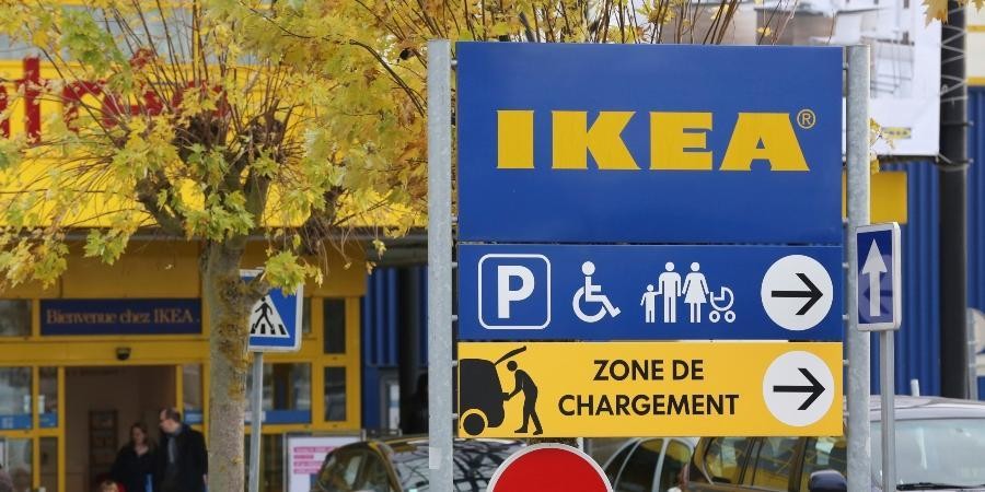Customers leave an IKEA store in Plaisir, west of Paris. (Photo AP)