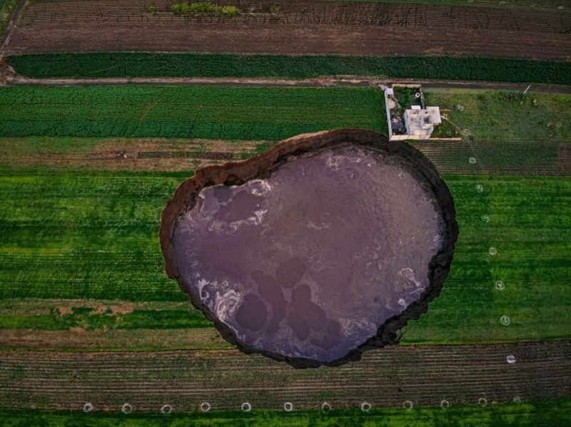 From a bird's eye view, a large crater filled with water can be seen.(IANS Photo)