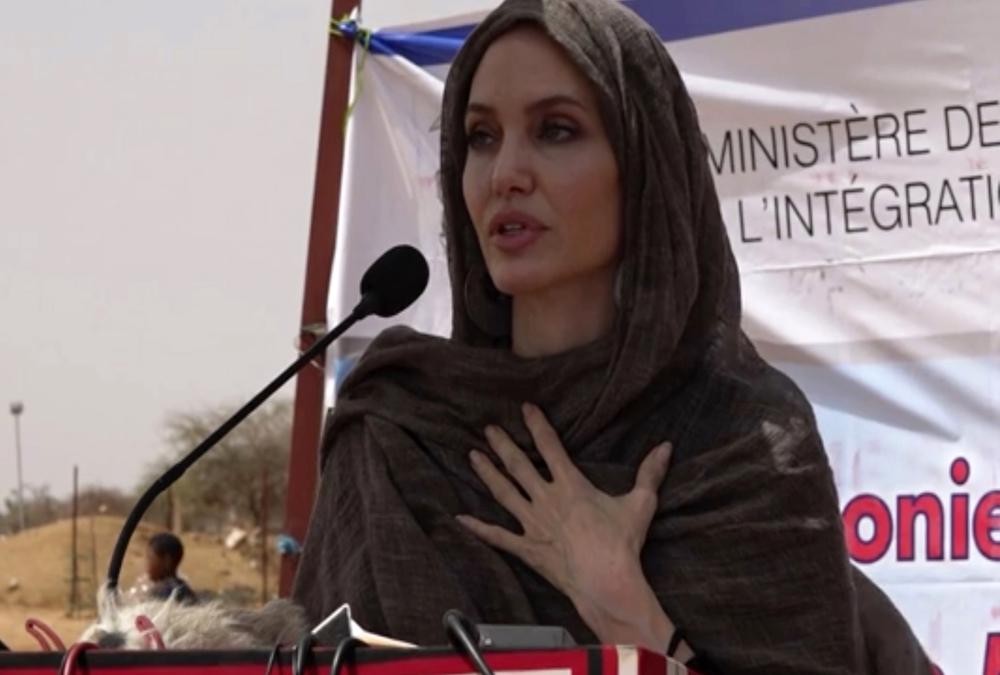 In this image taken from video, Special Envoy to the United Nations High Commissioner for Refugees Angelie Jolie speaks at the Malian refugee camp in Goudebo, Burkina Faso, Sunday June 20, 2021, to mark World Refugee day on Sunday. Hollywood actress Angelina Jolie has visited war-weakened Burkina Faso to show solidarity with people who continue to welcome the displaced, despite grappling with their own insecurity, and said the world isn’t doing enough to help. (AP Photo)