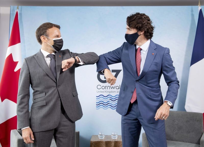 Canadian Prime Minister Justin Trudeau, right, welcomes French President Emmanuel Macron as the two leaders meet at the G7 Summit in Carbis Bay, Cornwall, England on June 12, 2021. (AP/PTI Photo)