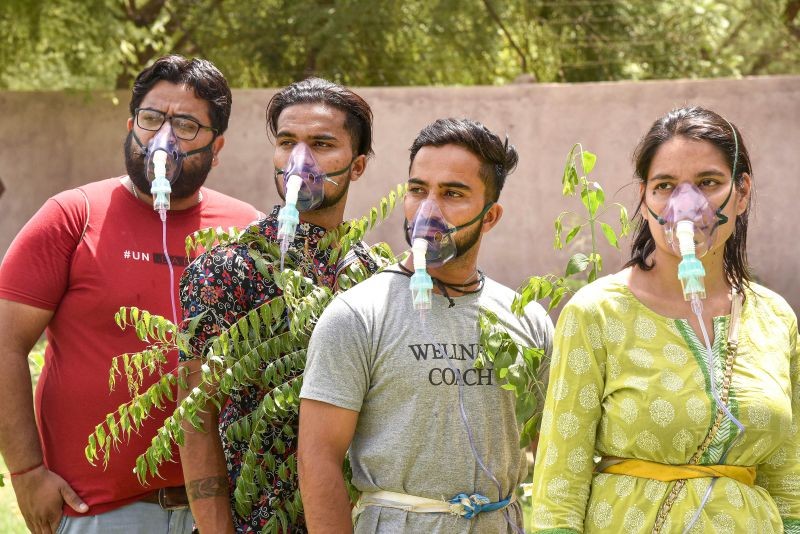 Bikaner: Rajasthani artists take part in an awareness event on plantation of trees, on the eve of World Environment Day, in Bikaner, Friday, June 4, 2021. (PTI Photo)