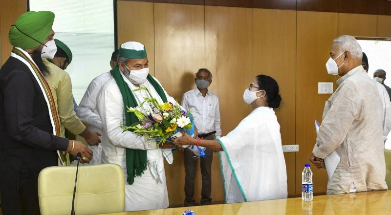 Bharatiya Kisan Union leader Rakesh Tikait meets West Bengal Chief Minister Mamata Banerjee, in Kolkata on June 9, 2021.TMC leader Yashwant Sinha also seen.  (PTI Photo)