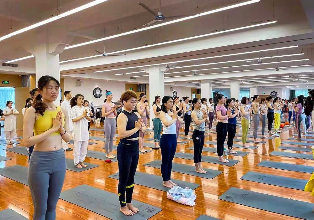 Hangzhou: People perform yoga on International Day of Yoga, in Hangzhou, Monday, June 21, 2021. (PTI Photo)