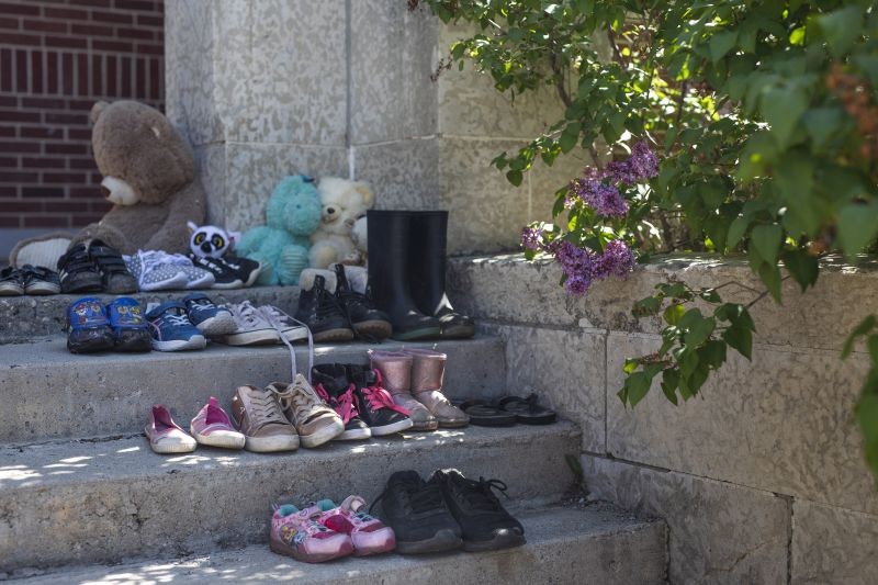 Muskowekwan First Nation : Children's shoes sit on the front steps the former Muskowekwan Indian Residential School during a press conference and prayer vigil at Muscowequan Indian Residential School, one of the last residential schools to close its doors in Canada in 1997 and the last fully intact residential school still standing in Saskatchewan at Muskowekwan First Nation, Saskatchewan on June 1, 2021. The vigil was in response to the remains of 215 children recently found at the Kamloops Indian Residential School. (AP/PTI Photo
