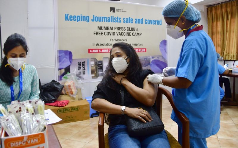 Mumbai: A health worker administers a dose of the COVID-19 vaccine to a journalist, during a special vaccination drive for journalists and their family members, organised by Mumbai Press Club with Surya Hospital, in Mumbai, Friday, June 4, 2021. (PTI Photo)