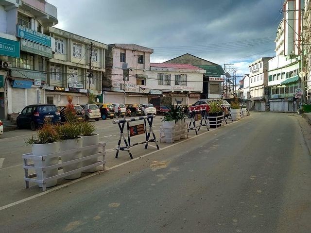 Planters being placed as Traffic Bollards alongside Traffic Barricades at Old NST area by the Kohima Smart City as part of "Streets for People" Challenge initiatives. (Photo Courtesy: Kohima Smart City)