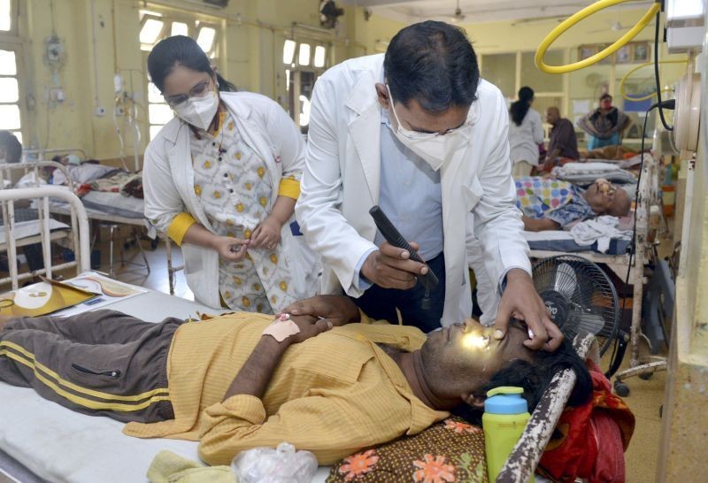 Doctors treat a patient infected with black fungus at NSCB Medical College and Hospital, in Jabalpur. (PTI File Photo)