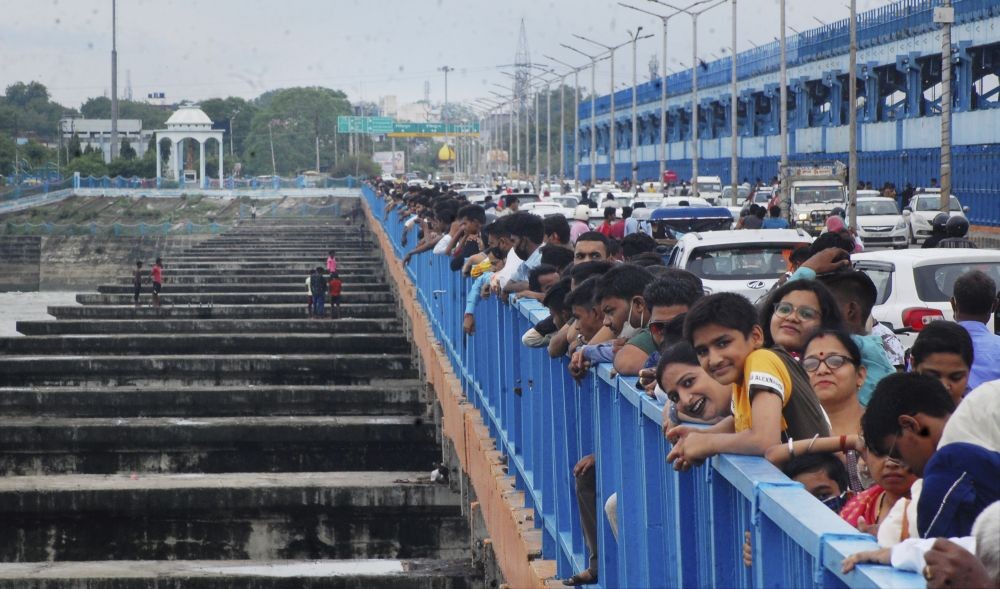 Kanpur: People without wearing masks, visit the Ganga barrage in Kanpur, Saturday, June 19, 2021. (PTI Photo