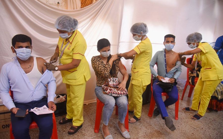 Mumbai: Beneficiaries receive a dose of COVID-19 vaccine during a special vaccination camp, at Vile Parle East in Mumbai, Tuesday, June 15, 2021. (PTI Photo)