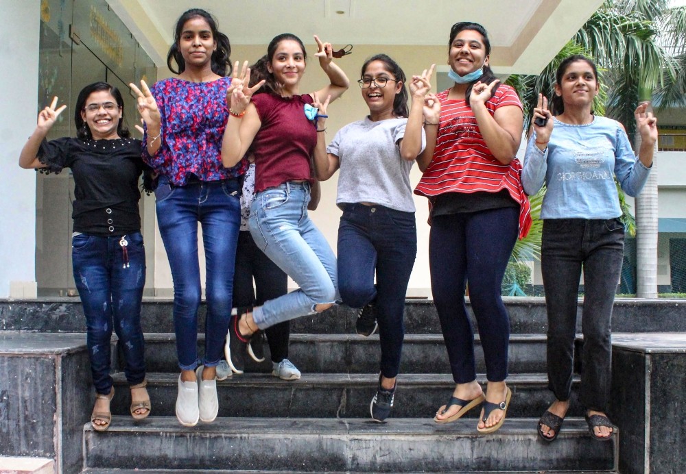 Gurugram: Students celebrate after CBSE declared class 12th results, in Gurugram, Friday, July 30, 2021. (PTI Photo)