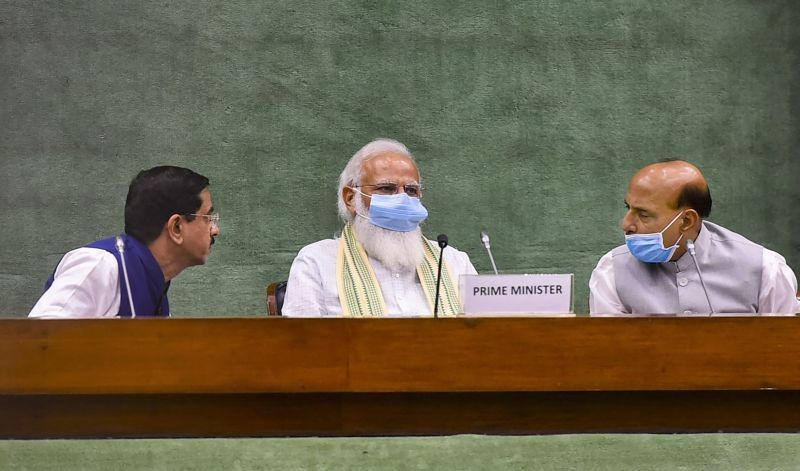 Prime Minister Narendra Modi during an all-party meeting, a day before the monsoon session of Parliament begins, in New Delhi on July 18, 2021. BJP leaders Rajnath Singh and Prahlad Joshi are also seen. (PTI Photo)
