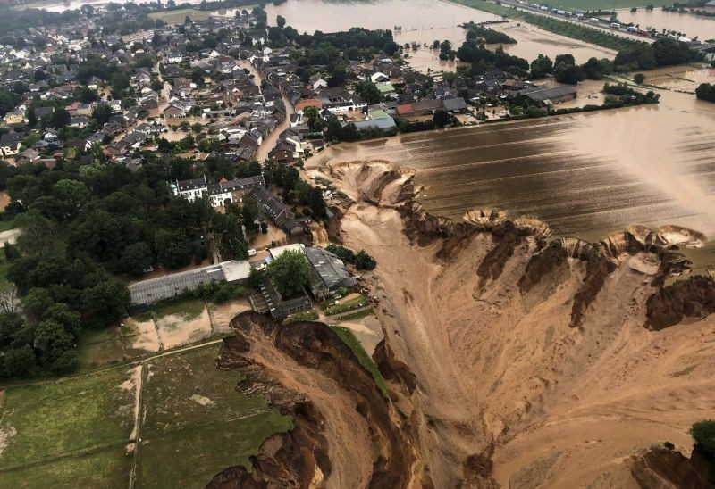 This image provided on July 16, 2021 by the Cologne district government shows the Blessem district of Erftstadt in Germany. Rescuers were rushing Friday to help people trapped in their homes in the town of Erftstadt, southwest of Cologne. Regional authorities said several people had died after their houses collapsed due to subsidence, and aerial pictures showed what appeared to be a massive sinkhole. (AP/PTI Photo)