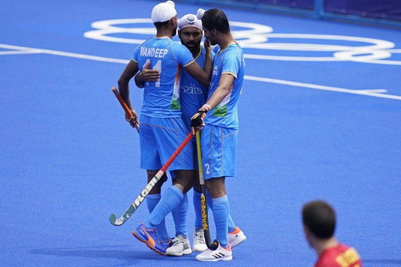 Tokyo:  India's Mandeep Singh (11) celebrates after India's Simranjeet Singh, center, scored against Spain during a Men's field hockey match at the 2020 Summer Olympics, Tuesday, July 27, 2021, in Tokyo, Japan.AP/PTI Photo