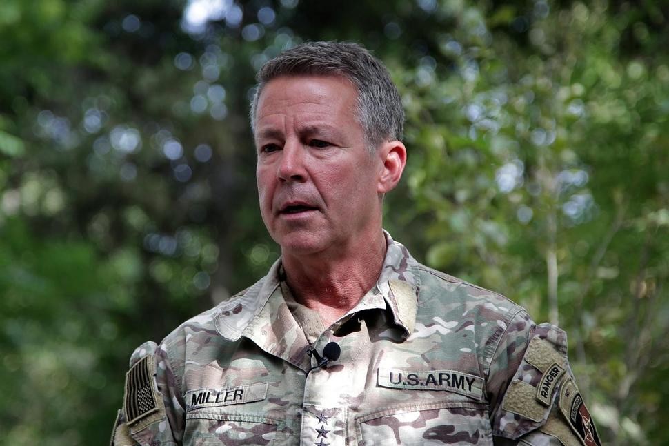 FILE - In this June 29, 2021 file photo, U.S. Army Gen. Scott Miller, the U.S.'s top general in Afghanistan, speaks to journalists at the Resolute Support headquarters, in Kabul, Afghanistan. Miller is to hand over his command at a ceremony in the capital of Kabul on Monday, July 12, 2021, as America winds down its 20-year military presence and Taliban insurgents continue to gain territory across the country. (AP Photo/Ahmad Seir, File) THE ASSOCIATED PRESS