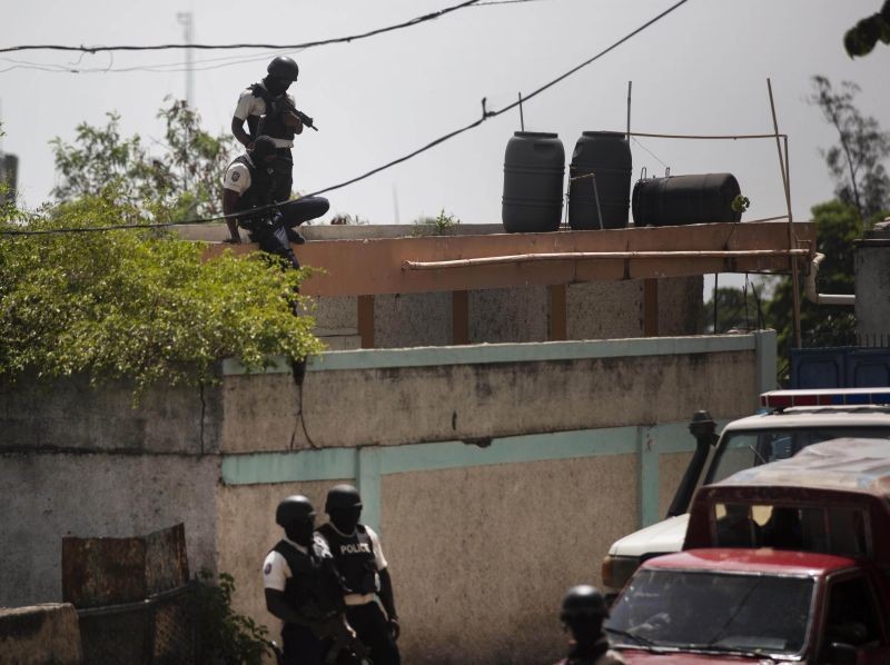 Police search the Morne Calvaire district of Petion Ville for suspects who remain at large in the murder of Haitian President Jovenel Moise in Port-au-Prince, Haiti on  July 9, 2021. Moise was assassinated on July 7 after armed men attacked his private residence and gravely wounded his wife, first lady Martine Moise. (AP/PTI Photo)