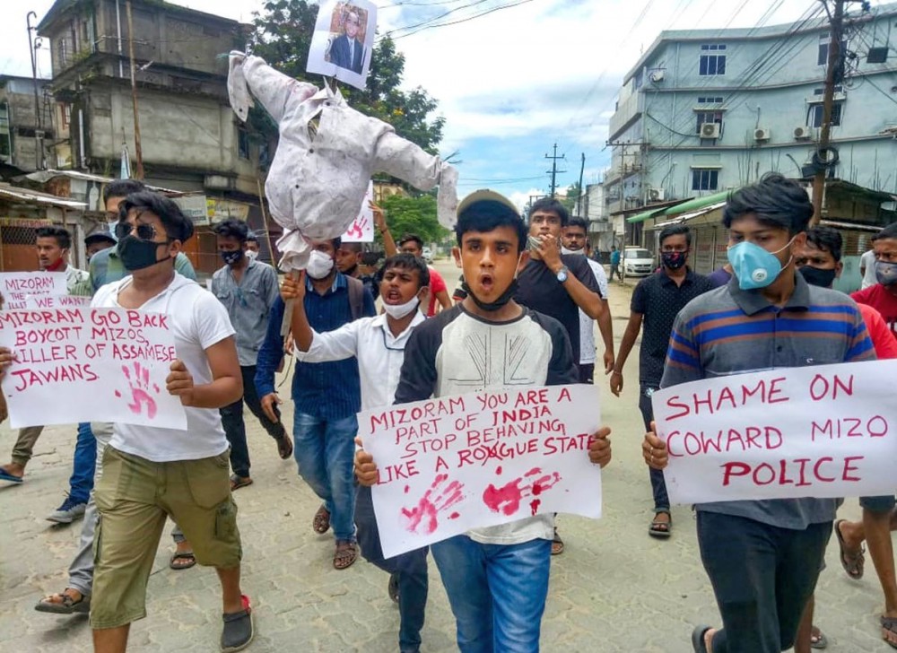 Locals carry an effigy of Mizoram Chief Minister Zoramthanga during a protest in front of Mizoram House, against the killing of five Assam Police personnel and one civilian in Assam-Mizoram border clash, at Lailapur in Cachar district. Photograph: PTI Photo