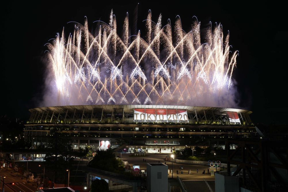 Tokyo:  Fireworks illuminate over the National Stadium during the opening ceremony of the 2020 Summer Olympics, Friday, July 23, 2021, in Tokyo. AP/PTI