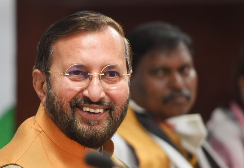 Union Environment Minister Prakash Javadekar with Minister of Tribal Affairs Arjun Munda during signing of a 'Joint Communication' between Ministry of Tribal Affairs and Ministry of Environment, Forest and Climate Change o further empower the tribal community, at Paryawaran Bhawan, in New Delhi on July 6, 2021. (PTI Photo)
