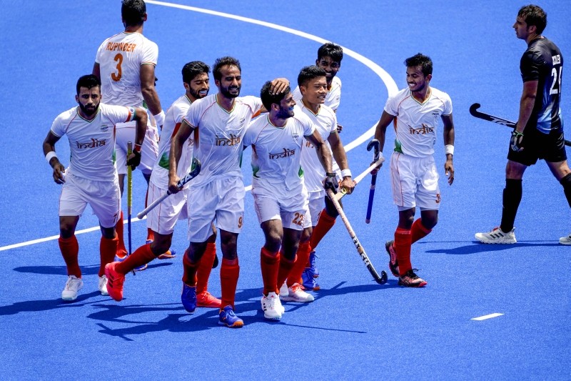 Tokyo: Indian player Varun Kumar celebrates with teammates after scoring a goal during their hockey match against Argentina at the 2020 Summer Olympics, Thursday, July 29, 2021, in Tokyo, Japan. (PTI Photo)