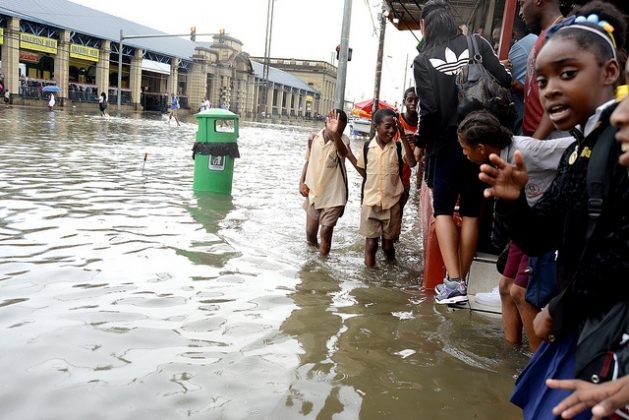 Flooding in Trinidad's capital of Port of Spain. As human activities have already caused approximately 1°C global warming above pre-industrial levels, impacts of the changing climate have already unfolded and manifested through floods, droughts, and heatwaves. Credit: Peter Richards/IPS