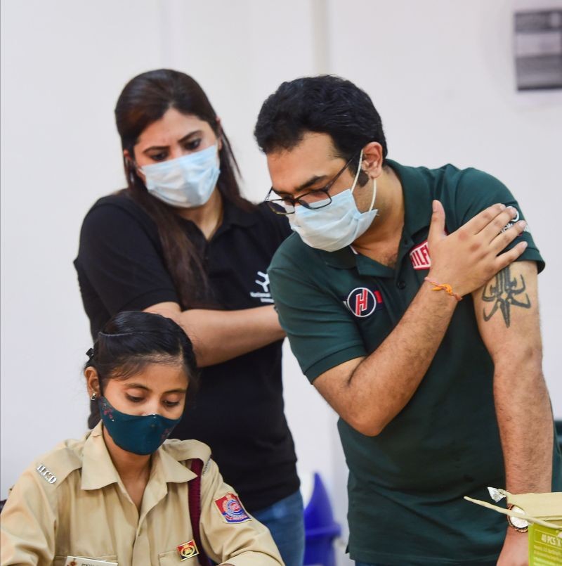 New Delhi: Beneficiaries give their details after receiving COVID-19 vaccine at a special centre for students going abroad for studies, in New Delhi, Monday, July 12, 2021. (PTI Photo/Kamal Kishore)