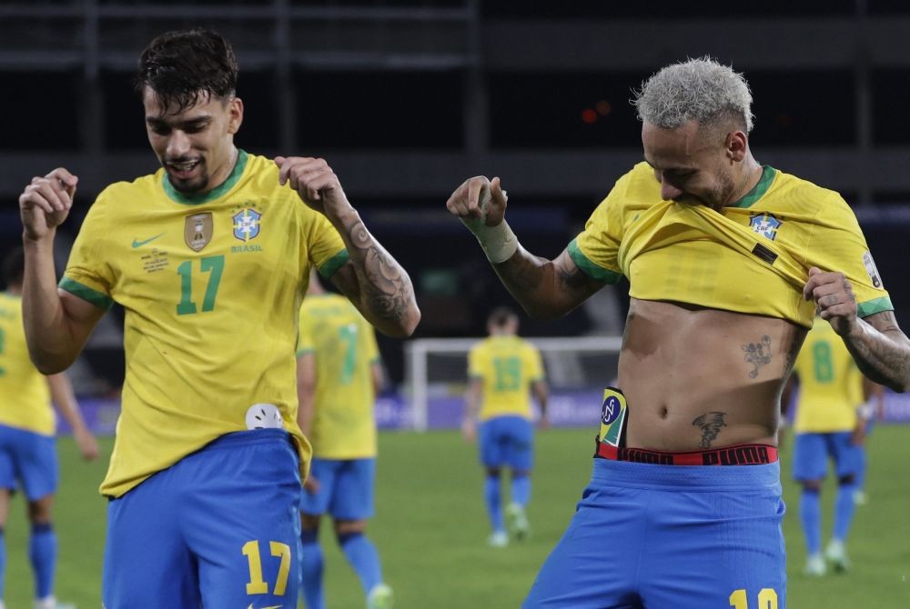 Rio de Janeiro: Brazil's Lucas Paqueta, left, celebrates with teammate Neymar after scoring his side's opening goal against Peru during a Copa America semifinal soccer match at Nilton Santos stadium in Rio de Janeiro, Brazil, Monday, July 5, 2021. AP/PTI