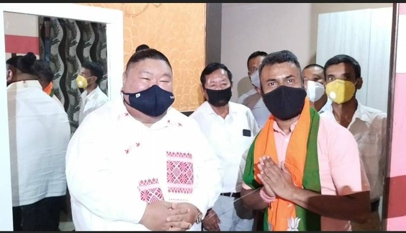 Nagaland Minister and State BJP President Temjen Imna Along during his meeting with Rupjyoti Kurmi, the erstwhile MLA representing Mariani Constituency, bordering Nagaland on July 17. (Photo Courtesy: @AlongImna/Twitter)