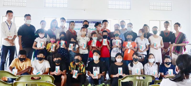 Students with CAKSU members and others during the distribution programme on July 24. (Photo Courtesy: CAKSU)