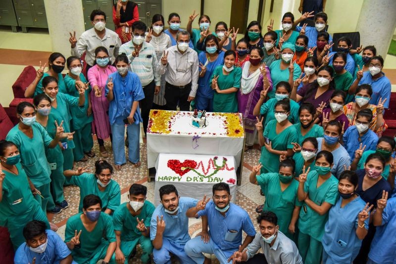 Doctors of NMMC Covid care centre celebrate National Doctors Day, at Rajasthan Bhawan at Vashi in Navi Mumbai on July 1, 2021. (PTI Photo)