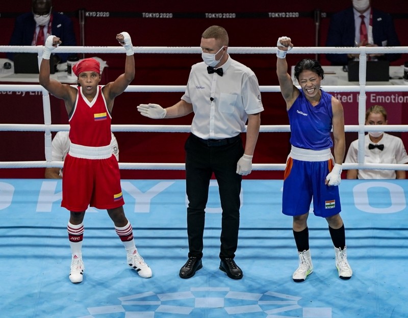 Tokyo: India's Mary Kom (R) reacts as Ingrit Valencia of Columbia is declared winner after their bout in women's Fly (48-51kg) boxing Round of 16, at the Summer Olympics 2020 in Tokyo, Thursday, July 29, 2021. (PTI Photo)