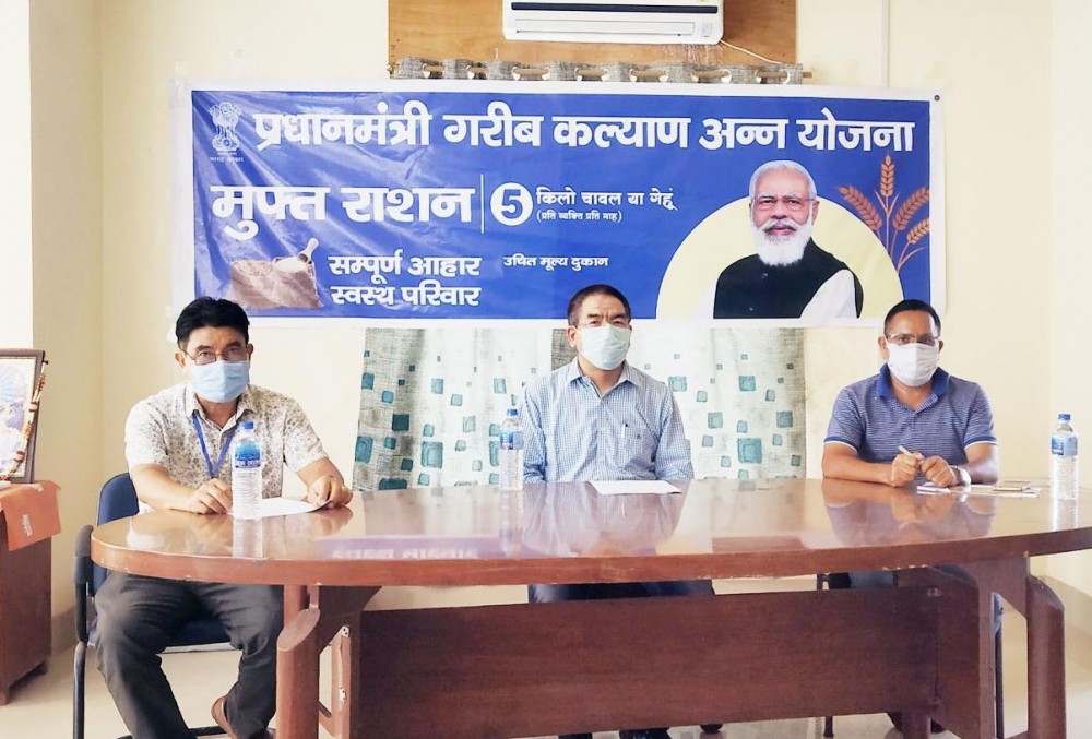 General manager, FCI Regional Office, Dimapur, K Tongsing (centre) with assistant GM (Co-ord), BS Solanki (right) and joint director, Food & Civil Supplies, Temsu Jamir, at a press conference on July 5. (Morung Photo)