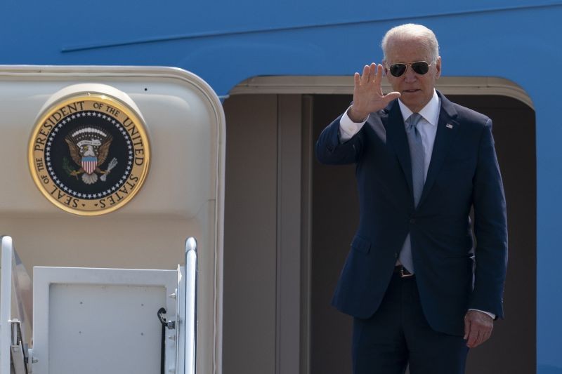 President Joe Biden waves as he boards Air Force One upon departure on July 7, 2021, at Andrews Air Force Base, Md. Biden is en route to Illinois. (AP/PTI Photo)