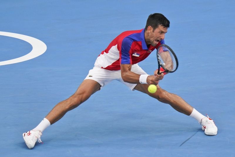 Novak Djokovick, of Serbia, plays Jan-Lennard Struff, of Germany, during the second round of the tennis competition at the 2020 Summer Olympics, Monday, July 26, 2021, in Tokyo, Japan. AP/PTI
